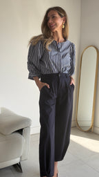 Pantalón bombacho botón