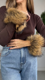 Puños de pelo natural